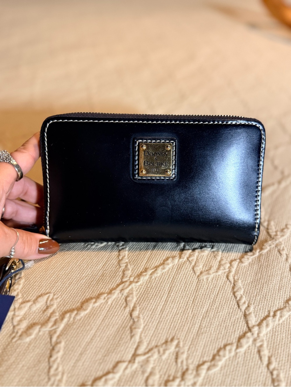 Dooney & Bourke Black Leather Zip Wristlet with Gold Plaque